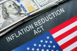 IMAGE: Inflation Reduction Act; $100 bill with American Flag