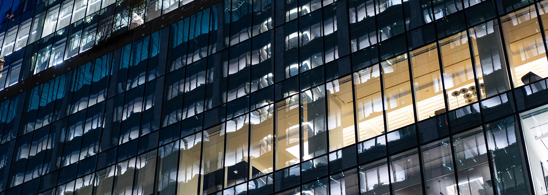 Bracewell Employee Benefits practice banner image, which shows the outside of an office building.
