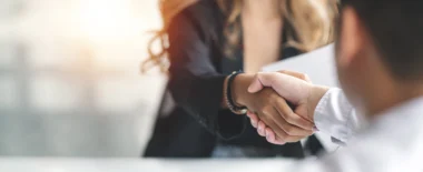 Two people shaking hands
