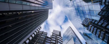 Bracewell Financial Institutions Litigation practice banner image, which shows several office buildings under a blue sky.