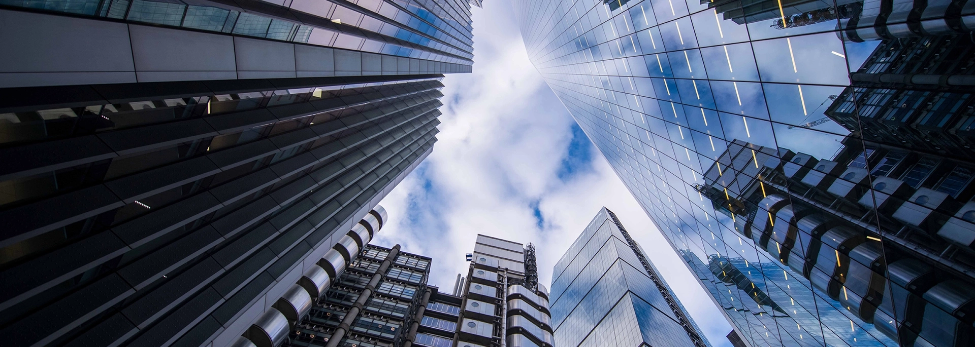Bracewell Financial Institutions Litigation practice banner image, which shows several office buildings under a blue sky.
