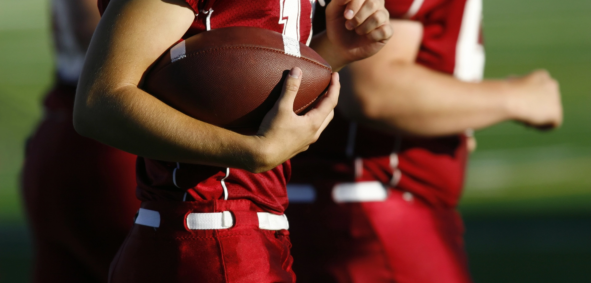 Player holding a football